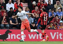 爱游戏登录入口-华尔夫赫和伯恩茅斯战平，保持中游位置